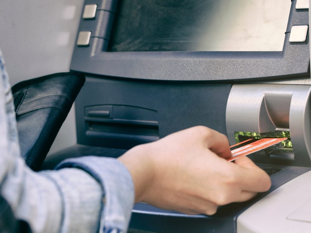 bank atm - customer using atm image